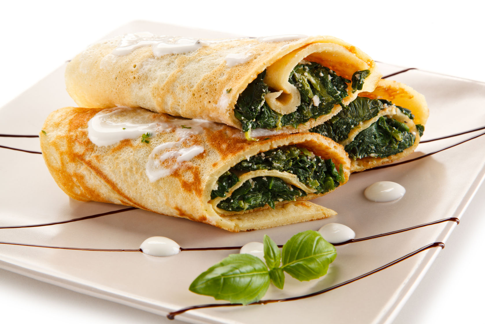 Crepes de espinaca y queso ricota al estilo de Leo Morán