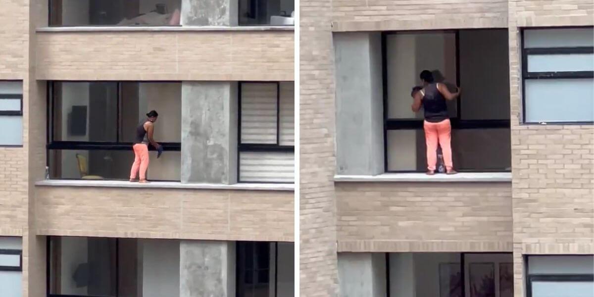 Mujer arriesga su vida para limpiar unas ventanas desde un piso 12